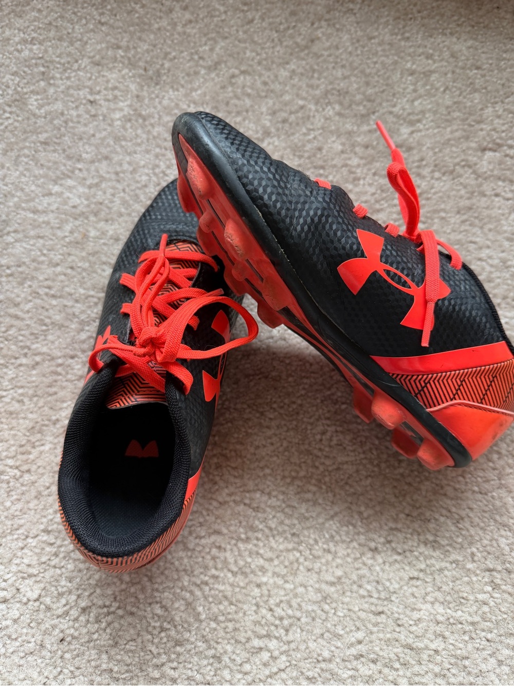 Under Armour Kids Black and Orange Soccer Cleats size 2Y